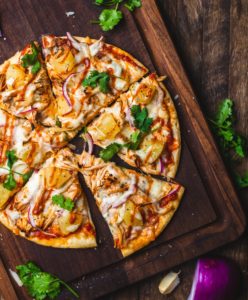 tasty pizza on a wooden board