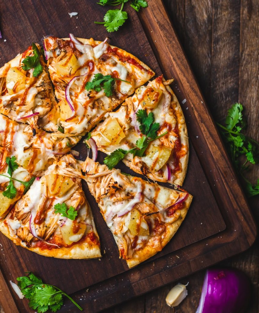 tasty pizza on a wooden board