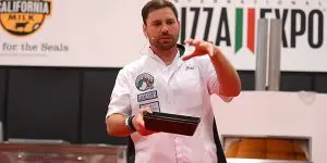 man speaking at International Pizza Expo