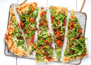 flatbread pizza cut into wedges