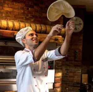 tossing pizza dough 1