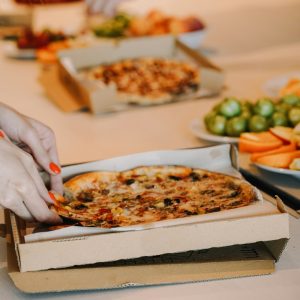 lala azizli thin curst pizza box lady unsplash cropped